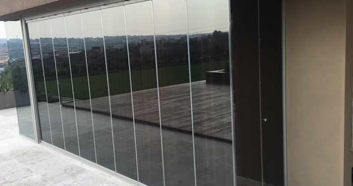 TMG Designs - Frameless folding doors
