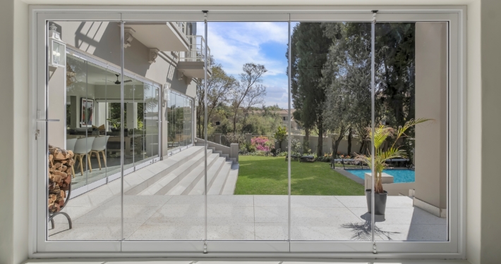 TMG Designs - Frameless Folding Doors