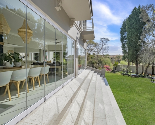 TMG Designs - Frameless Folding Doors