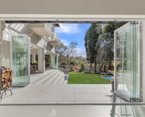TMG Designs - Frameless Folding Doors